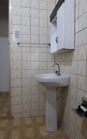Casa à venda com 215m², 2 quartos e 1 vagaBanheiro de Baixo
