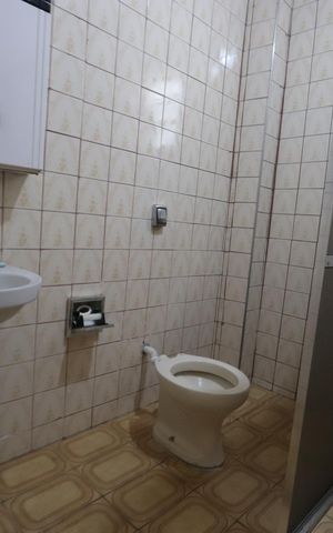 Casa à venda com 215m², 2 quartos e 1 vagaBanheiro de Baixo