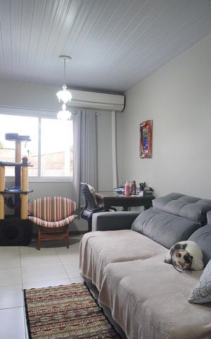 Casa de condomínio à venda com 55m², 3 quartos e 2 vagasSala