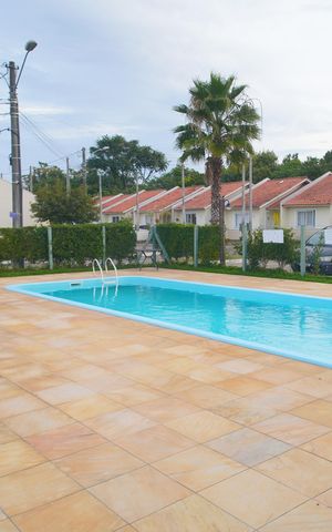 Casa de condomínio à venda com 55m², 3 quartos e 2 vagasÁrea comum - Piscina
