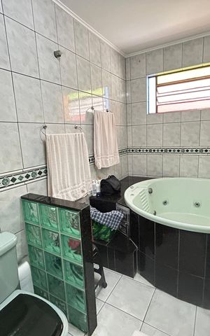 Casa à venda com 341m², 6 quartos e 2 vagasBanheiro da Suíte