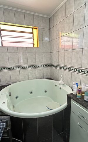 Casa à venda com 341m², 6 quartos e 2 vagasBanheiro da Suíte