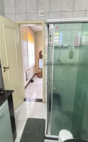 Casa à venda com 341m², 6 quartos e 2 vagasBanheiro da Suíte