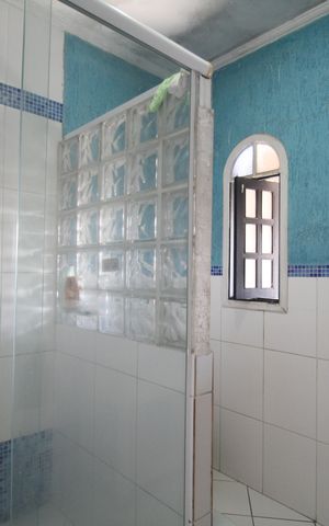 Casa à venda com 250m², 4 quartos e 2 vagasBanheiro
