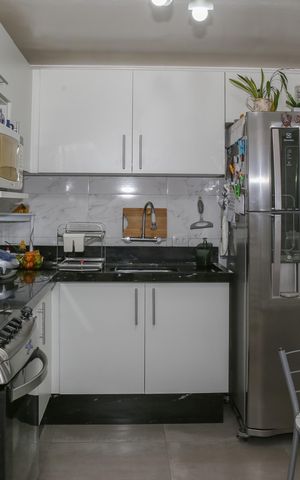 Casa de condomínio à venda com 90m², 2 quartos e 1 vaga Casa de condomínio à venda com 90m², 2 quartos e 1 vagaCozinha