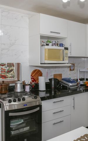 Casa de condomínio à venda com 90m², 2 quartos e 1 vaga Casa de condomínio à venda com 90m², 2 quartos e 1 vagaCozinha