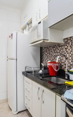 Apartamento à venda com 55m², 2 quartos e 1 vaga Apartamento à venda com 55m², 2 quartos e 1 vagaCozinha e Área de Serviço