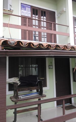 Casa de condomínio para alugar com 80m², 2 quartos e 1 vagaFachada
