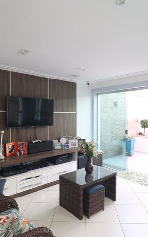 Casa à venda com 175m², 3 quartos e 3 vagasSala de TV