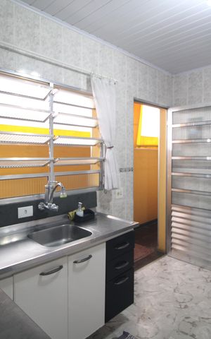Casa à venda com 200m², 4 quartos e 4 vagasCasa 2/ cozinha