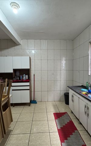 Casa à venda com 96m², 4 quartos e 2 vagas Casa à venda com 96m², 4 quartos e 2 vagasCozinha