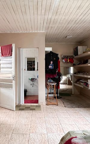 Casa à venda com 210m², 4 quartos e 2 vagas Casa à venda com 210m², 4 quartos e 2 vagasSuíte - Casa 1