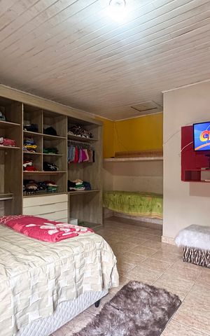 Casa à venda com 210m², 4 quartos e 2 vagas Casa à venda com 210m², 4 quartos e 2 vagasSuíte - Casa 1