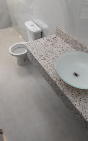 Casa à venda com 110m², 3 quartos e 2 vagasBanheiro da Suíte