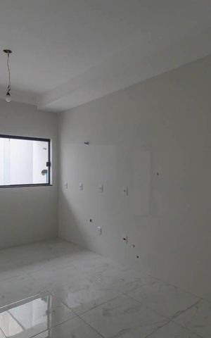 Casa à venda com 110m², 3 quartos e 2 vagas Casa à venda com 110m², 3 quartos e 2 vagasCozinha