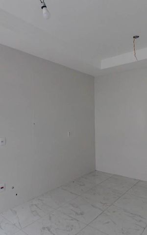 Casa à venda com 110m², 3 quartos e 2 vagas Casa à venda com 110m², 3 quartos e 2 vagasCozinha