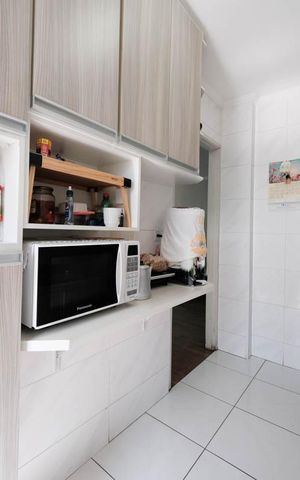 Apartamento à venda com 60m², 2 quartos e 1 vagaCozinha e Área de Serviço