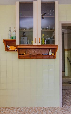 Casa à venda com 95m², 2 quartos e 2 vagas Casa à venda com 95m², 2 quartos e 2 vagasCozinha