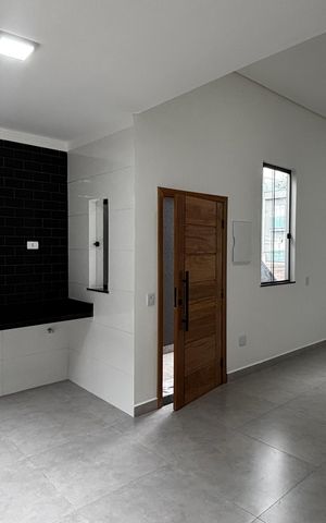 Casa à venda com 74m², 2 quartos e 2 vagas Casa à venda com 74m², 2 quartos e 2 vagasSala - Cozinha