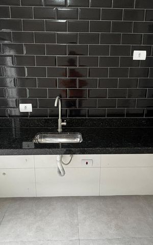 Casa à venda com 74m², 2 quartos e 2 vagas Casa à venda com 74m², 2 quartos e 2 vagasSala - Cozinha