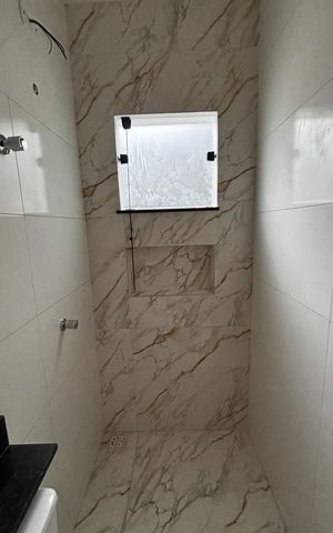 Casa à venda com 74m², 2 quartos e 2 vagas Casa à venda com 74m², 2 quartos e 2 vagasBanheiro