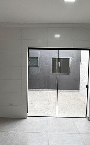 Casa à venda com 74m², 2 quartos e 2 vagas Casa à venda com 74m², 2 quartos e 2 vagasSala - Cozinha