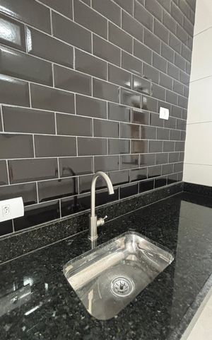 Casa à venda com 74m², 2 quartos e 2 vagas Casa à venda com 74m², 2 quartos e 2 vagasSala - Cozinha