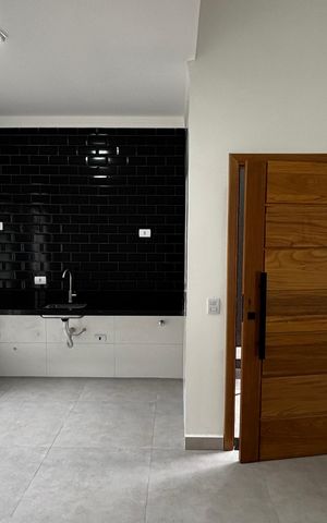 Casa à venda com 74m², 2 quartos e 2 vagas Casa à venda com 74m², 2 quartos e 2 vagasSala - Cozinha