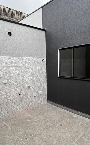 Casa à venda com 74m², 2 quartos e 2 vagas Casa à venda com 74m², 2 quartos e 2 vagasSala - Cozinha
