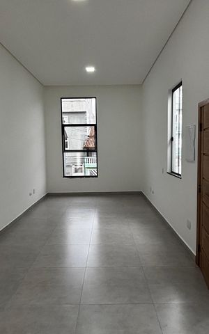 Casa à venda com 74m², 2 quartos e 2 vagas Casa à venda com 74m², 2 quartos e 2 vagasSala - Cozinha