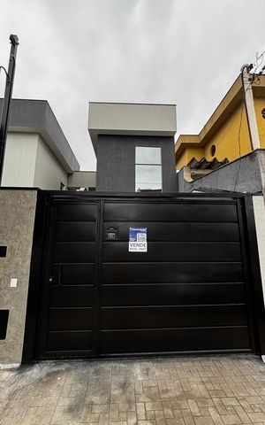 Casa à venda com 74m², 2 quartos e 2 vagas Casa à venda com 74m², 2 quartos e 2 vagasFachada
