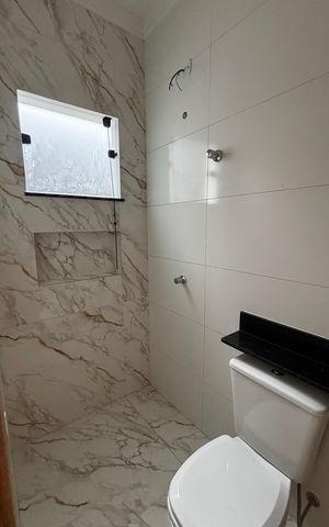 Casa à venda com 74m², 2 quartos e 2 vagas Casa à venda com 74m², 2 quartos e 2 vagasBanheiro