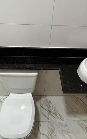 Casa à venda com 74m², 2 quartos e 2 vagas Casa à venda com 74m², 2 quartos e 2 vagasBanheiro da Suíte