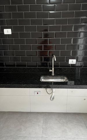 Casa à venda com 74m², 2 quartos e 2 vagas Casa à venda com 74m², 2 quartos e 2 vagasSala - Cozinha