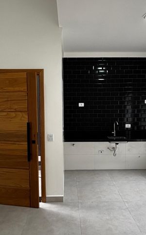 Casa à venda com 74m², 2 quartos e 2 vagas Casa à venda com 74m², 2 quartos e 2 vagasSala - Cozinha