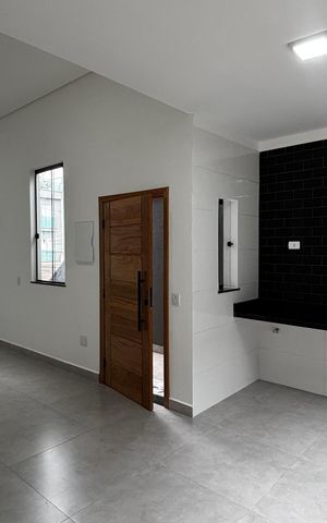 Casa à venda com 74m², 2 quartos e 2 vagas Casa à venda com 74m², 2 quartos e 2 vagasSala - Cozinha