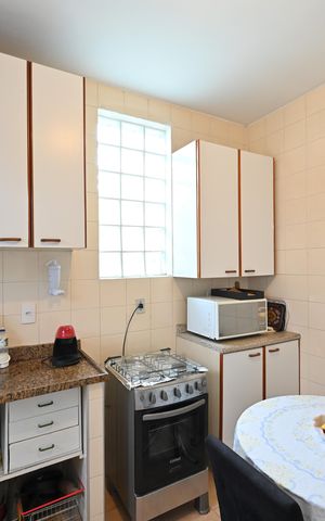 Casa para alugar com 100m², 2 quartos e 2 vagasCozinha