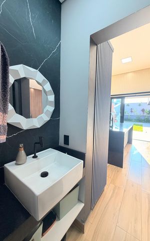 Casa de condomínio à venda com 208m², 3 quartos e 4 vagasLavabo