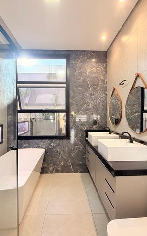 Casa de condomínio à venda com 208m², 3 quartos e 4 vagasBanheiro da Suíte