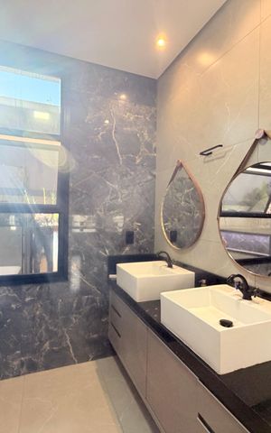 Casa de condomínio à venda com 208m², 3 quartos e 4 vagasBanheiro da Suíte