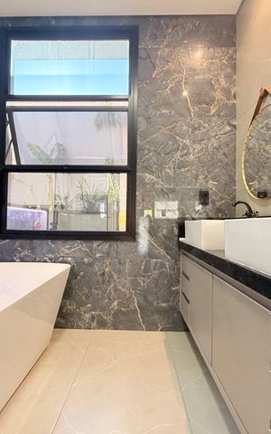 Casa de condomínio à venda com 208m², 3 quartos e 4 vagasBanheiro da Suíte