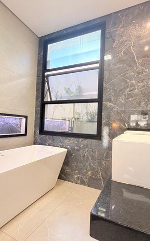 Casa de condomínio à venda com 208m², 3 quartos e 4 vagasBanheiro da Suíte