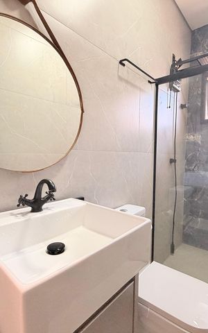Casa de condomínio à venda com 208m², 3 quartos e 4 vagasBanheiro Social 