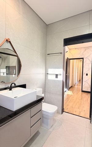 Casa de condomínio à venda com 208m², 3 quartos e 4 vagasBanheiro da Suíte