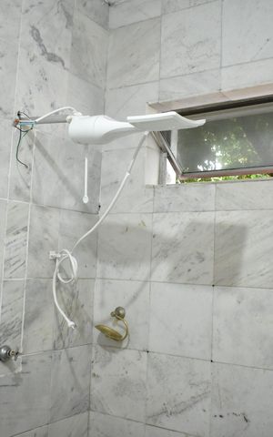 Casa à venda com 120m², 2 quartos e 2 vagasBanheiro da Suíte 2