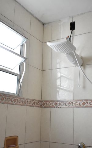 Casa à venda com 120m², 2 quartos e 2 vagasBanheiro da Suíte 1