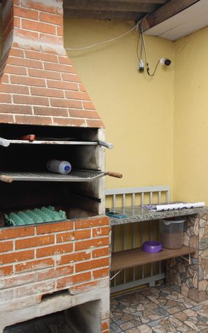 Casa à venda com 161m², 4 quartos e 2 vagaschurrasqueira