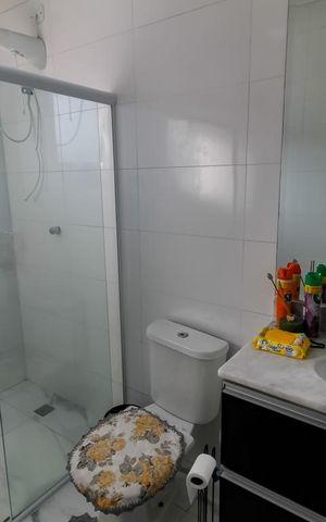 Casa de condomínio à venda com 250m², 3 quartos e 4 vagas Casa de condomínio à venda com 250m², 3 quartos e 4 vagasBanheiro da Suíte 1