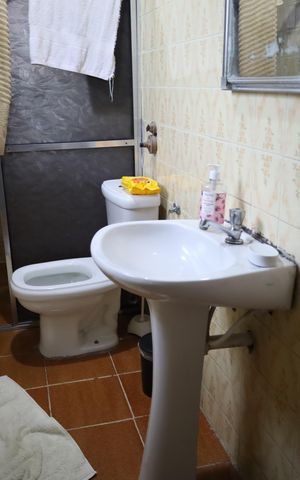 Casa à venda com 268m², 4 quartos e 2 vagasBanheiro da Suíte