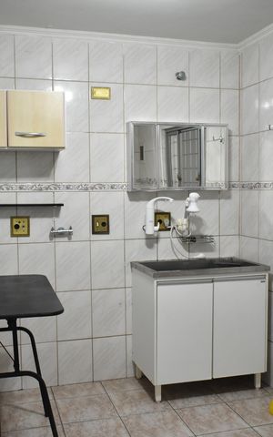 Casa à venda com 150m², 3 quartos e 2 vagasLavanderia 1